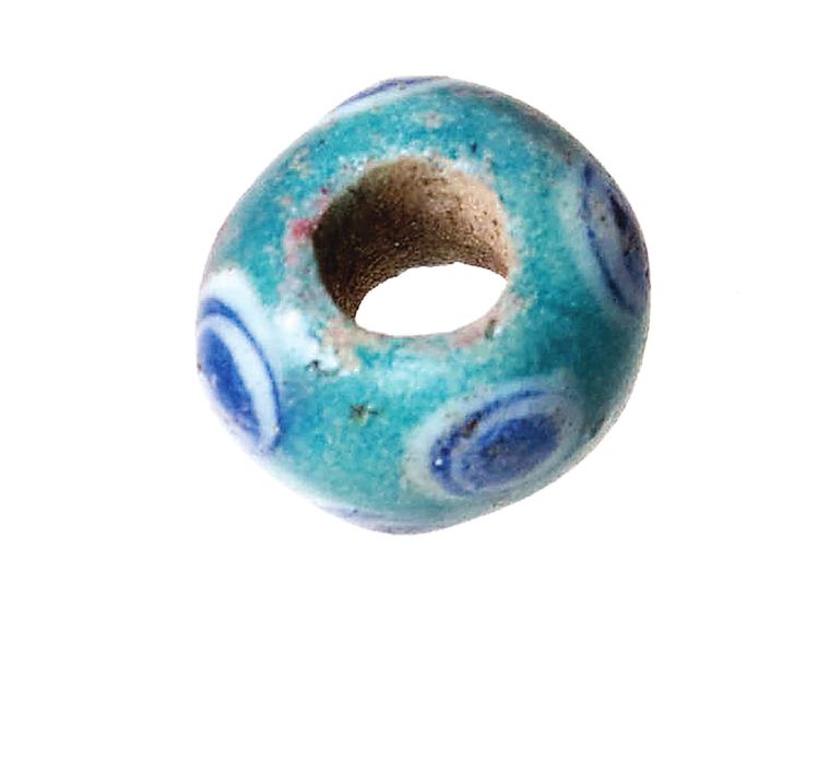 Doa oculada de pasta vítrea azul con motivos de ollos
